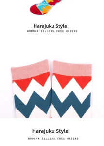 Detailed close-up of retro cotton crew socks with zigzag geometric knit patterns