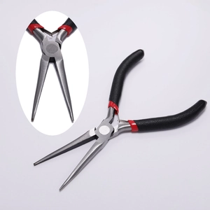 Detail of needle nose jewelry pliers with black and red non-slip grip on white background