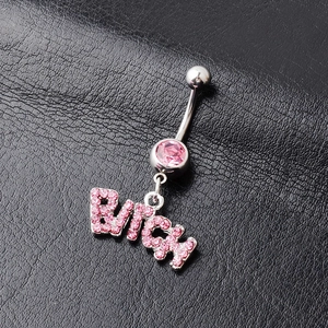 Close-up of silver navel ring with pink crystal Bitch pendant on black leather