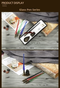 Macro view of vintage glass dip pen gift set with ink and metallic calligraphy nibs