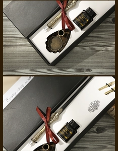 Macro view of vintage quill pen set with engraved metallic nib and classic ink bottle