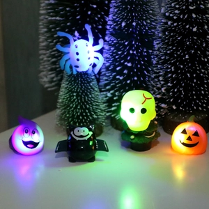 Halloween LED glowing rings featuring pumpkin bat and ghost shapes in dark background