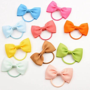 Set of 10 colorful grosgrain ribbon bow hair ties for girls in multiple pastel shades