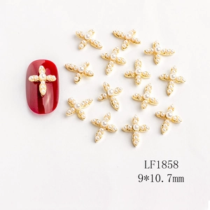 Golden alloy cross nail charms with white pearls and rhinestones size 9x10.7mm