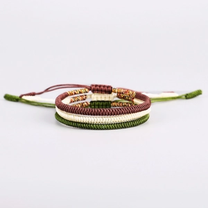 Handmade woven knot bracelets in brown, beige, and green with adjustable sliding knots