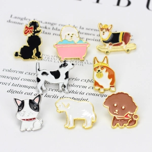 Set of 8 colorful enamel dog pins including corgi, poodle and bulldog on white paper