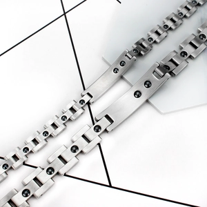 Men's magnetic titanium steel link bracelet with black stones and matte silver finish