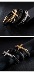 Detailed view of leather cross bracelets in gold, black, and silver finishes with magnetic clasp