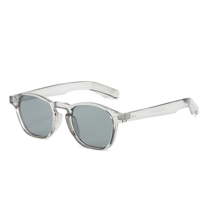 Retro grey transparent square sunglasses with tinted lenses shown at a 45-degree angle