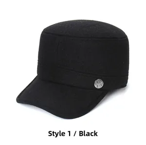 Close-up of black wool cadet cap featuring a vintage silver star metal decorative button