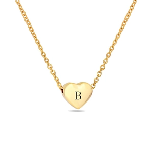 Macro shot of gold heart-shaped pendant featuring laser-engraved letter B on cable chain