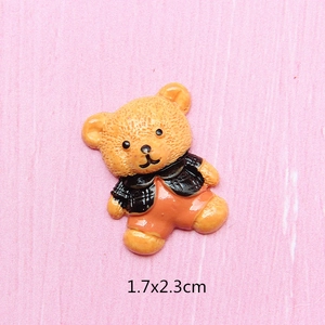 Detail shot of a 1.7x2.3cm resin cartoon bear charm with glossy finish for DIY crafts