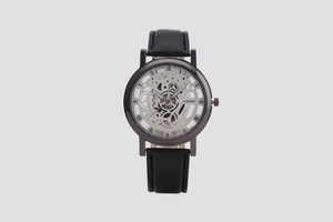 Detailed macro view of a men's skeleton quartz watch with elegant black leather strap