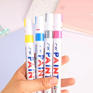 Set of four colorful waterproof oil-based paint markers for DIY graffiti and signing