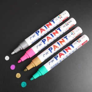 Set of waterproof paint markers in gold silver and metallic colors for photo albums