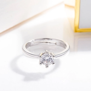 Polished silver couple ring with six-prong set diamond and adjustable open design