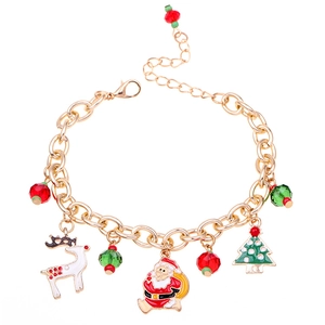 Christmas charm bracelet with Santa, reindeer, and tree on a gold-plated alloy chain