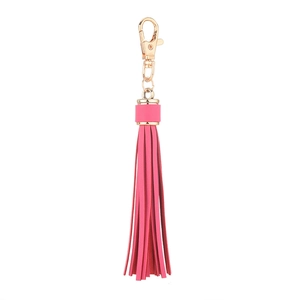 Magenta PU leather tassel keychain with gold lobster clasp hanging on white background