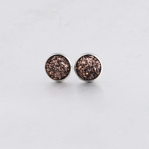 Detail of 10mm silver stud earrings featuring sparkling brown drusy stones in a pair