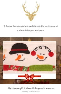 Detail of Christmas snowman embroidery on white felt refrigerator handle protective covers
