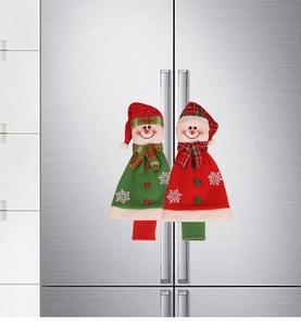 Detail of Christmas snowman themed refrigerator handle covers in red and green soft fabric
