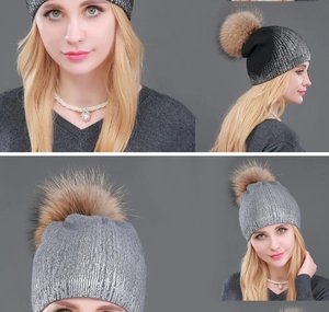 Detail view of winter knitted beanie with gradient silver foil and large fur pom pom