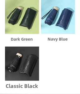 Three mini flat folding umbrellas in green, blue, and black with UPF 50+ sun protection