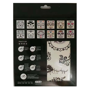 Detail showing Day of the Dead face tattoo packaging with instructions and patterns