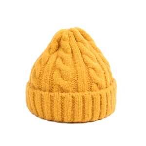 Classic mustard yellow cable knit beanie hat with cuff for autumn and winter warmth