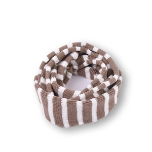 Detail view of brown and white striped knitted scarf with soft ribbed texture