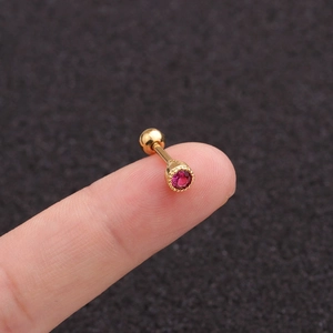 Gold stainless steel screw-back stud earring with a pink round zircon on fingertips