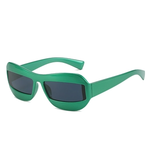 Futuristic cat eye sunglasses in bright green frame with dark black lenses for women