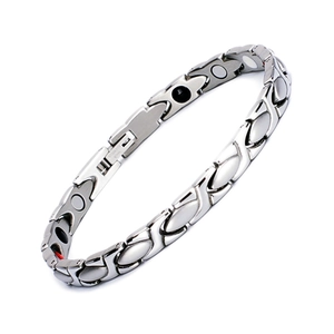 Polished silver stainless steel magnetic therapy bracelet for men on white background