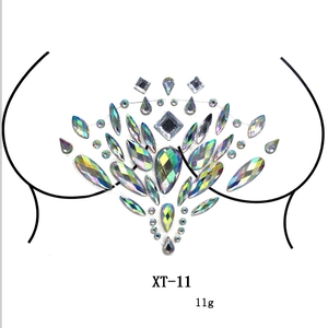 Detailed view of rainbow AB resin rhinestone chest stickers for festival body decoration