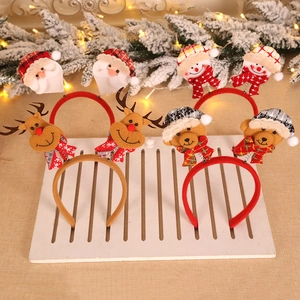 Christmas headbands collection featuring Santa Claus, snowman, elk, and bear characters