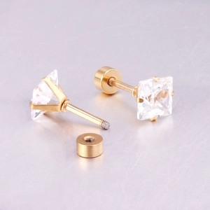 Macro detail of square zircon stud earrings with gold plating and secure screw back closure