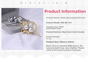Detail of matte gold and silver flower brooch featuring pearls and crystals on jewelry box