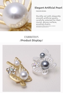 Macro detail of butterfly brooch with faux pearls, intricate cut-outs and crystal accents