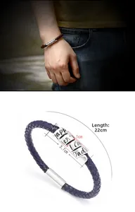 Close-up of woven leather bracelets with Happy Father's Day engraving on metal tube