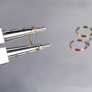 Polished stainless steel nose rings set in gold, silver and rose gold finishes