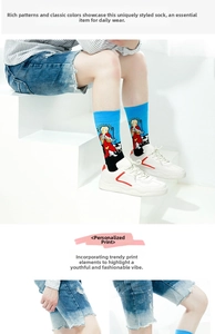 Detail of artistic character print on blue cotton mid-calf socks with sports sneakers