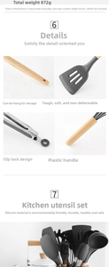 Detail of dark grey silicone kitchen utensils with wooden handles and hanging holes