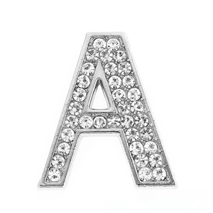 Macro view of crystal encrusted silver letter A charm for DIY bracelets and jewelry