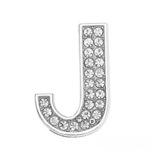 Detail view of the silver letter J slide charm with sparkling crystal rhinestones