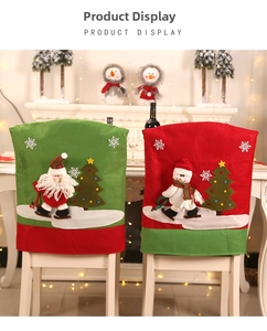 Detail of Santa and Snowman Christmas chair covers with 3D embroidery on festive dining chairs