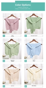 Detail view of knitted shawls in six colors including mint green and pastel blue