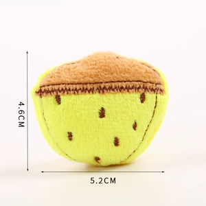 Detailed size view of yellow and brown plush fruit accessory measuring 5.2 cm x 4.6 cm