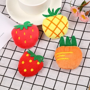 Plush fruit and vegetable charms featuring strawberry, pineapple and carrot designs