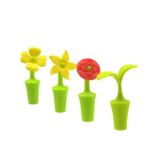 Set of 4 creative floral silicone wine stoppers with yellow flowers and rose on white background
