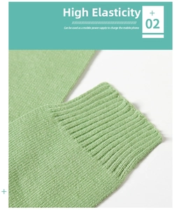 Macro detail showing high-elasticity ribbed cuff texture on light green knitted shawl